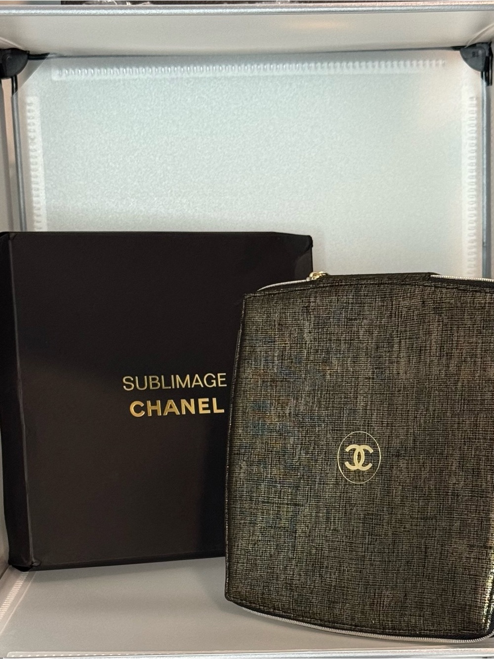 CHANEL Gold-Stamped Textured Black Toiletry Pouch